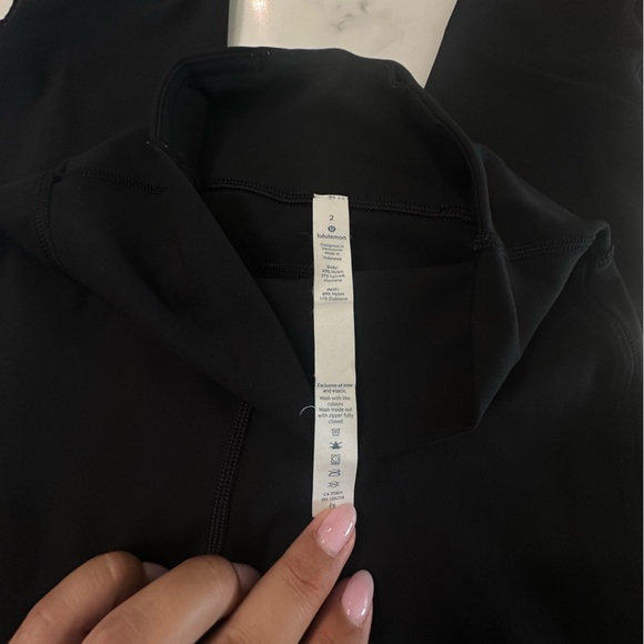 Lululemon Black “Tied to it” High Rise Leggings with mesh/tied ankle detail. - Picture 13 of 13